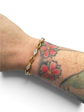 Vintage Signed Roman Gold Tone Clear Oval Rhinestone Link Tennis Bracelet 7.5”